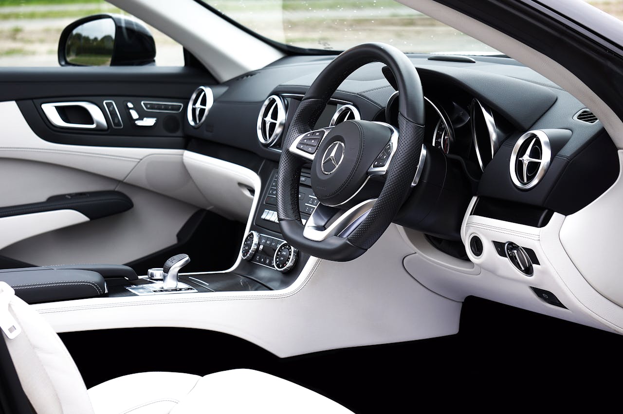The Art of Drawing Readers In: Your attractive post title goes here Explore the sleek and luxurious interior of a modern Mercedes sports car.